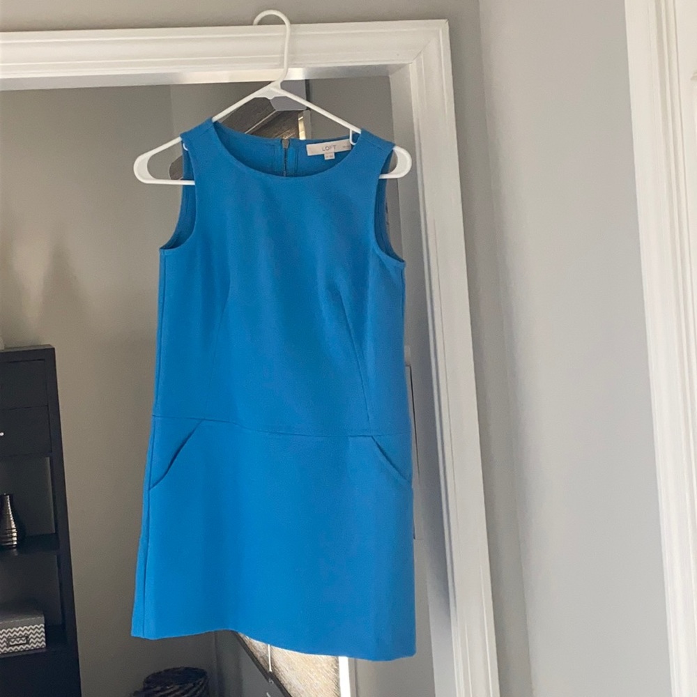 Light blue sleeveless shell dress